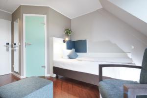 Ein Sitzbereich in der Unterkunft Stadthotel Freiburg Kolping Hotels & Resorts