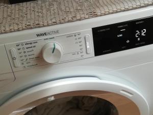 a close up of a washing machine at Apartment Felix in Split