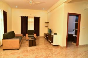 Posezení v ubytování Elegant Serviced Apartment