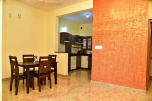 Kuchyň nebo kuchyňský kout v ubytování Elegant Serviced Apartment