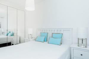 Posteľ alebo postele v izbe v ubytovaní Apartamenty Morska Fala-Gardenia