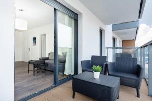 Posedenie v ubytovaní Apartamenty Morska Fala-Gardenia