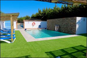 Πισίνα στο ή κοντά στο Bungalow La Roa IV