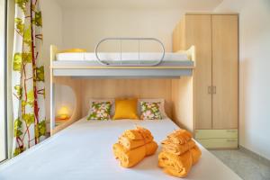 A bed or beds in a room at LE NOBILI DIMORE - appartamenti a Gallipoli