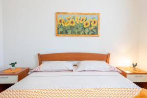 A bed or beds in a room at LE NOBILI DIMORE - appartamenti a Gallipoli