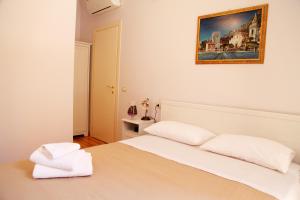 Posteľ alebo postele v izbe v ubytovaní Bed & Breakfast Duomo Di Taormina