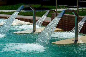 a water slide in a swimming pool at Grand Hotel Terme Sirmione in Sirmione