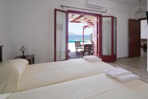 Katil atau katil-katil dalam bilik di ANEFANTI VILLAS +70 gambar