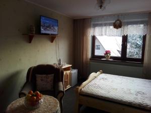 Una cama o camas en una habitación de Willa Katarzynka