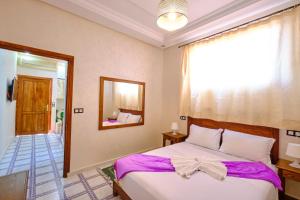 Postel nebo postele na pokoji v ubytování Hotel Central Palace