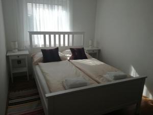 Postel nebo postele na pokoji v ubytování Guesthouse Šebalj