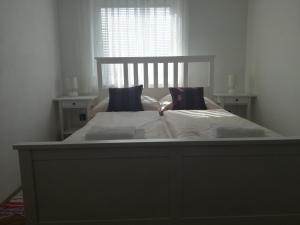Postel nebo postele na pokoji v ubytování Guesthouse Šebalj