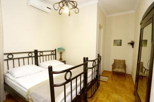 Voodi või voodid majutusasutuse Bloom Boutique Hotel toas