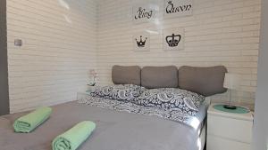 Posteľ alebo postele v izbe v ubytovaní Apartament Tygrys