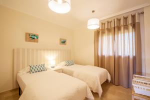 Posteľ alebo postele v izbe v ubytovaní 2279-Lovely 2 bedrooms with terrace with views
