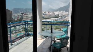 a view of a balcony with a table and chairs at CALPE9A in Calpe