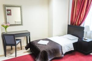 Cama ou camas em um quarto em SCSK Żurawia