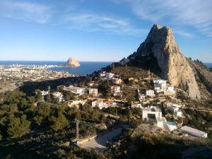 an aerial view of a mountain with the ocean at CALPE9A in Calpe +14 photos