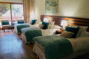 Postel nebo postele na pokoji v ubytování Hotel Marbella Resort