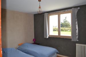 Postel nebo postele na pokoji v ubytování CoRide