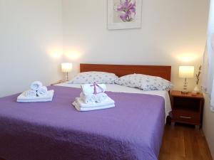 Postel nebo postele na pokoji v ubytování Apartment Tihana