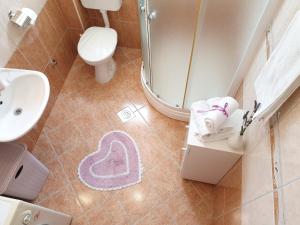 Koupelna v ubytování Apartment Tihana + 30 fotografií
