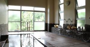 a large room with a large window and a sink at Oyado Matsubaya / Vacation STAY 8065 in Obinata