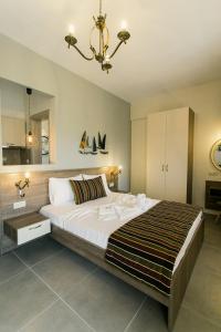 Posteľ alebo postele v izbe v ubytovaní Frangeo boutique rooms