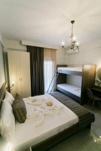 Posteľ alebo postele v izbe v ubytovaní Frangeo boutique rooms