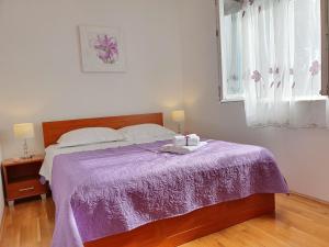 Postel nebo postele na pokoji v ubytování Apartment Tihana