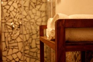 Postel nebo postele na pokoji v ubytování Un coccodrillo a FrAsSiNo