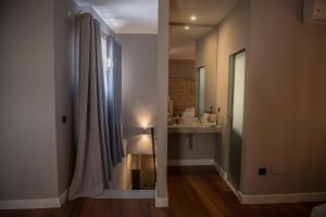 Koupelna v ubytování Hotel Don Juan Boutique
