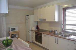 Kuchyňa alebo kuchynka v ubytovaní Apartamento Vacacional Relax frente al mar