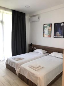 Voodi või voodid majutusasutuse Citro Villa toas
