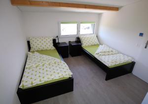 Uma cama ou camas num quarto em BeachIN - Sport, Events, Hotel, Restaurant, Bar