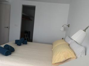Łóżko lub łóżka w pokoju w obiekcie Casa Luz