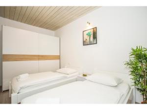 Cama o camas de una habitación en Spaladium - City Center Apartments