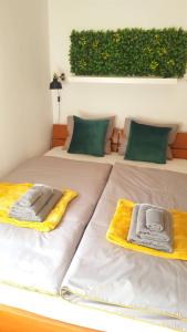 Posteľ alebo postele v izbe v ubytovaní Apartment Greenhouse