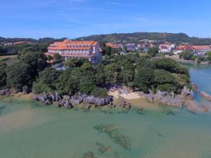 an aerial view of an island in the water at Hotel Olimpo in Isla