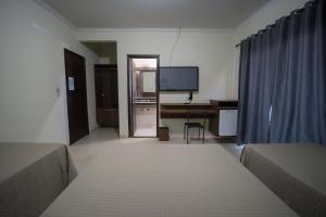 TV a/nebo společenská místnost v ubytování Hotel Campo Verde