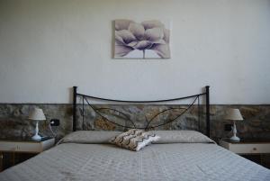 A bed or beds in a room at Villa Sara