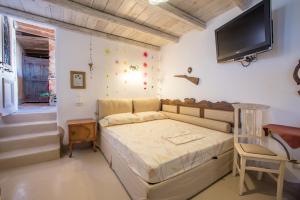 Un pat sau paturi într-o cameră la Anthippi