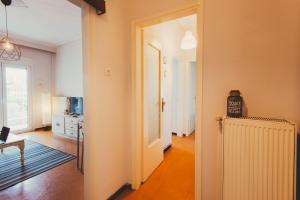Televízia a/alebo spoločenská miestnosť v ubytovaní Comfy & Relaxing Apartment