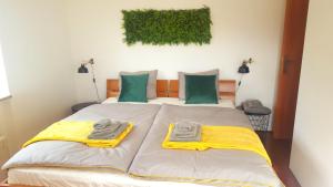 Postel nebo postele na pokoji v ubytování Apartment Greenhouse