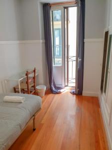 Posteľ alebo postele v izbe v ubytovaní Pension Aussie Guesthouse