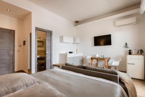 Postel nebo postele na pokoji v ubytování 231 Suite Via Roma