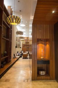 a lobby with wooden walls and a long hallway at Exclusivo High End Studio en Palermo Soho -T309- in Buenos Aires