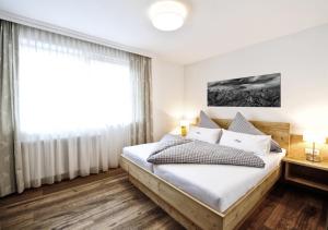 Postel nebo postele na pokoji v ubytování Appartements Rosenhof