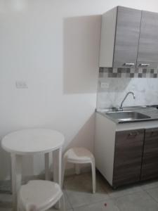 Dapur atau dapur kecil di El Hogar de Ami