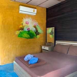 Postel nebo postele na pokoji v ubytování PD Guesthouse